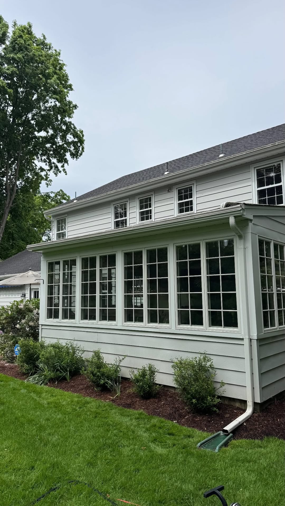 Exterior window cleaning on Bergen County home